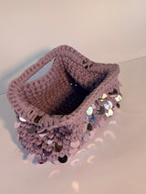 Dusty lilac crochet clutch covered in iridescent paillettes with an integrated top handle