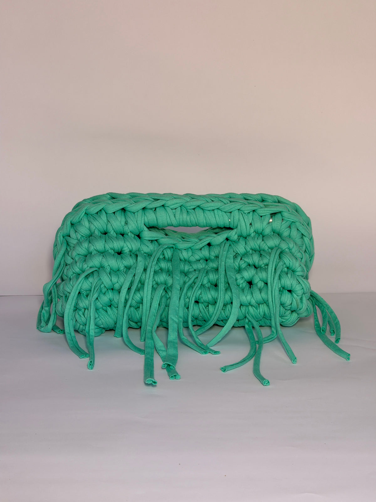 Handmade crochet Mojito clutch in bright mint green cotton tube yarn