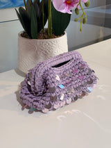 Dusty lilac crochet clutch covered in iridescent paillettes with an integrated top handle