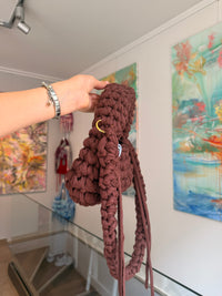 Deep brown crochet shoulder bag with a hand-braided strap