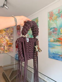 Deep brown crochet tote bag with braided handles and long fringe