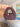 Deep plum-brown crochet bag with a rounded top handle